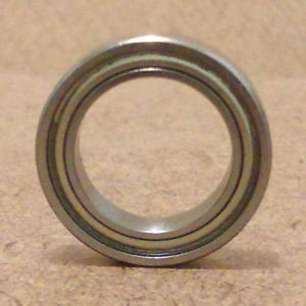 1/8 inch bore. Radial Ball Bearing. Metal. (1/8 X 1/4 X 7/64). Lowest Friction #1 image
